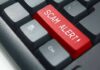 Smart Ring Hype Exposed – Ponzi Verdict Stuns Keyboard with red scam alert key