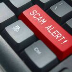 Keyboard with red scam alert key