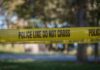 Two Ole Miss Deaths, One Strange Common Thread yellow police tape cordoning off an outdoor area