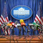 Press Pass Purge Sparks First Amendment Fight Press microphones at a White House briefing podium