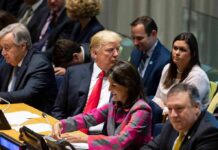 U.S. Walkout Explodes Iran’s UN Spin Donald Trump seated between António Guterres and Nikki Haley, with Mike Pompeo in the foreground at a meeting