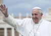 Blood-Soaked Chapel Draws Pope elderly man in white religious attire waving outdoors