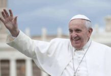 Blood-Soaked Chapel Draws Pope elderly man in white religious attire waving outdoors