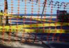 Intruder Scare At Kamala Harris’ Malibu Home Orange safety net and yellow police tape blocking a beach access