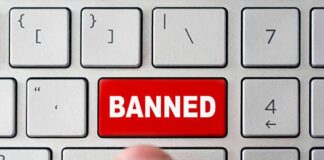 red banned key on computer keyboard