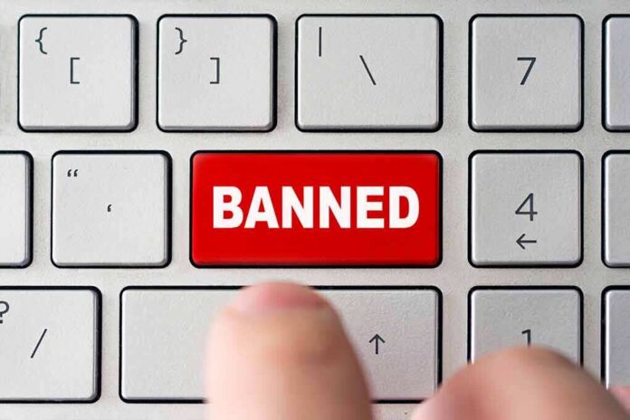 shutterstock_1790081768 red banned key on computer keyboard