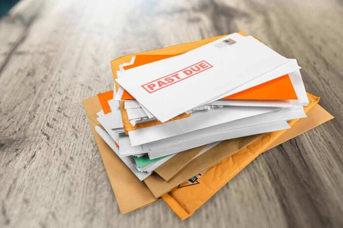 shutterstock_1810991899-1 Stack of mail with past due notice on top