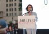 Domestic Dispute Bombshell Rattles Governor Race woman speaking at a podium during an outdoor event