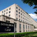 Nuclear Watchdog Escalates – What’s Tehran Hiding? Department of State building exterior on a sunny day