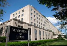 Nuclear Watchdog Escalates – What’s Tehran Hiding? Department of State building exterior on a sunny day