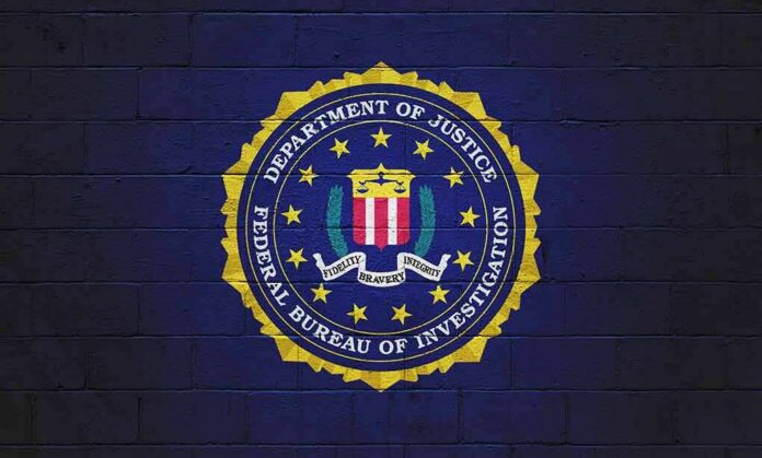 shutterstock_2073117407 FBI seal painted on a dark brick wall