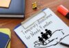 White House Rewires Childcare Cash Clipboard with TANF form and family icon on desk