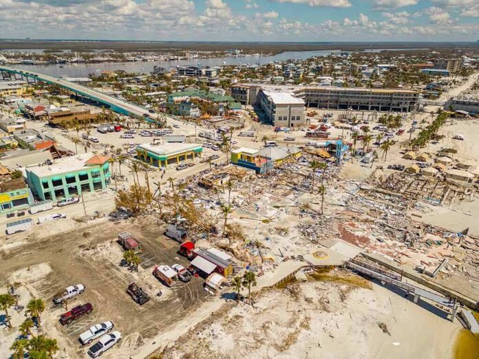 Aerial view of coastal town with widespread storm damage