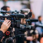 Engine Debris? Window Explodes Mid-Flight Video cameras on tripods at a media event