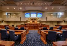 Jack Smith’s Arctic Frost Stuns Capitol Courtroom interior with wooden benches and judge's bench