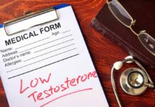 medical form on clipboard with stethoscope and glasses