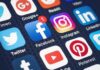 Age-Check Blitz Hits Social Media Smartphone screen showing social media app icons