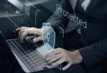 OpenAI’s Project Lily Exposed Person typing on laptop with digital security shield overlay