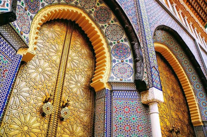 shutterstock_709086157 ornate golden doors with colorful mosaic arches