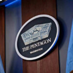 Trump Authorizes Firing Squad – First Since ’61 The Pentagon emblem between two flags.