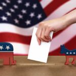 Hollywood Defection Stuns Democrats Hand casting ballot between Republican elephant and Democratic donkey