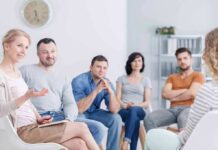 Viral Chemo Stat Misleads Millions Support group meeting with six adults seated in a circle