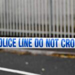 Police tape reading do not cross at a cordoned area