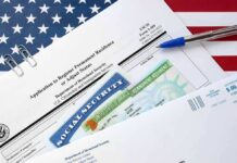 Visa Crackdown Slams Microsoft immigration forms with green card and social security card on US flag background