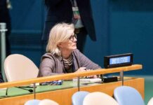Iran Ties Rattle Code Pink Boss Woman seated at a United Nations desk with a United States nameplate