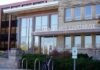 Waukesha County Courthouse entrance with glass facade and signage