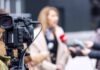 ‘We Have Guns Too’ Explodes Online Video camera filming an outdoor media interview