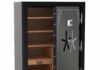 Mom-Bought Shotgun Triggers Legal Firestorm Open black safe with digital keypad and shelves inside