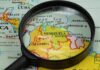 Power Play in Venezuela Sparks Global Jitters Magnifying glass over a map of northern South America