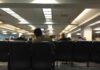 NJ Mayor Explodes Mid-Meeting – Cameras Rolling People seated in a waiting room with rows of chairs