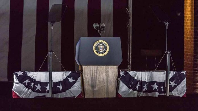 Presidential podium with microphones and teleprompters